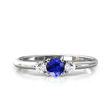 Charger l'image dans la galerie, Solitaire épaulé en or blanc palladié 750 serti d'une Tanzanite centrale de 4 mm
