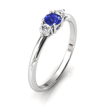 Charger l'image dans la galerie, Solitaire épaulé en or blanc palladié 750 serti d'une Tanzanite centrale de 4 mm
