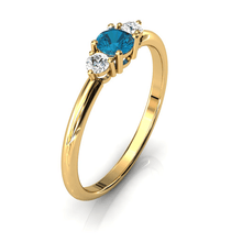 Charger l'image dans la galerie, Solitaire épaulé en or jaune 750 serti d'une Topaze Blue London centrale de 4 mm
