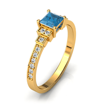 Charger l'image dans la galerie, Solitaire en or jaune 750 serti d'une Aigue-marine en taille princesse
