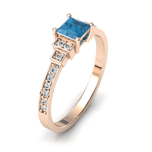 Charger l'image dans la galerie, Solitaire en or rose 750 serti d'une Aigue-marine en taille princesse
