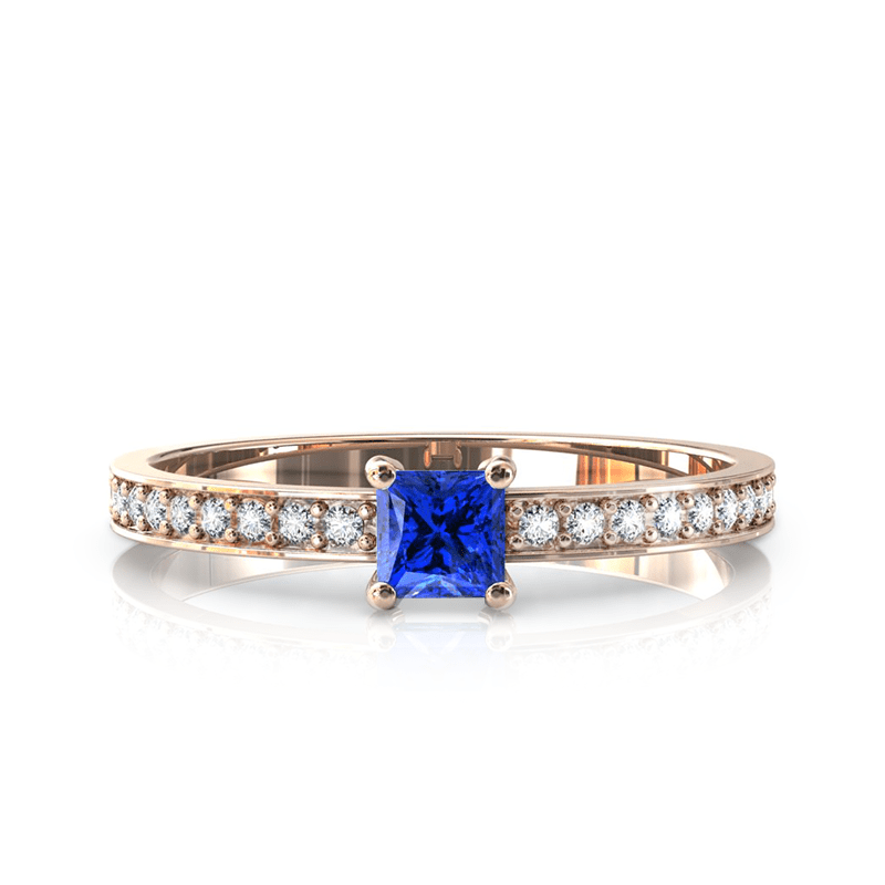 Solitaire en or rose 750 serti d'une Tanzanite en taille princesse